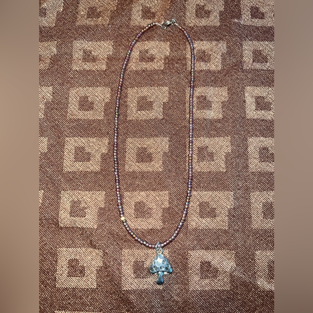 Handmade jewelry with silver mushroom